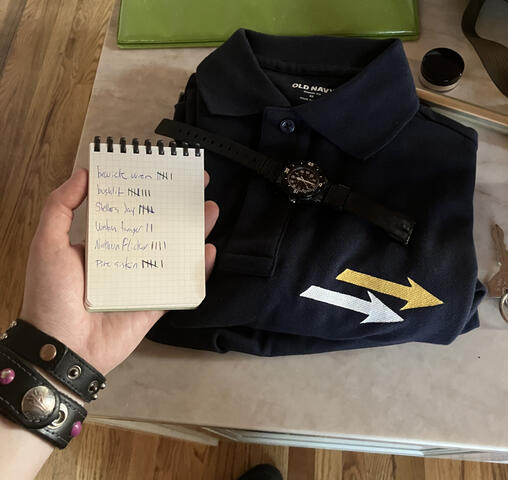 Hand painted shirt with logo and notebook prop